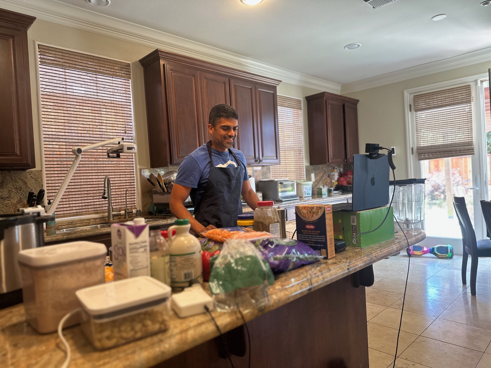 Dr. Rak in the kitchen during a Mindful Meals cook-along for RAK ON Tribe